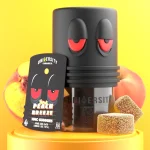 Mango Tango HHC Premium Gummies jar with orange cubes